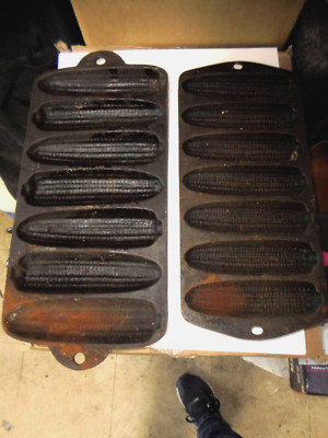 TWO VINTAGE CAST IRON CORN BREAD MUFFIN PAN, 7 CORN SHAPED SLOTS ON A PAN
