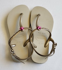 girls gold flip flops