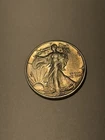 1944-D Denver Walking Liberty Silver Half 50c Uncirculated AU/BU Toned