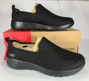 sketchers black slip ons