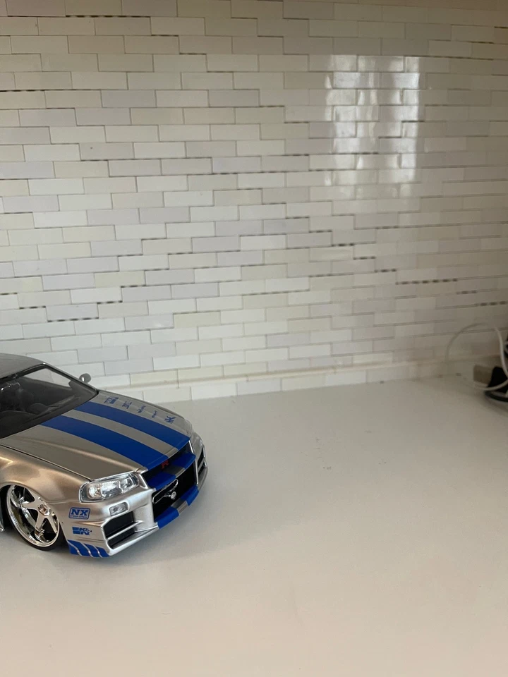 jada toys NISSAN SKYLINE GT-R 2002 FAST & FURIOUS METALLIC BLU 1:24 - Immagine 3 di 4