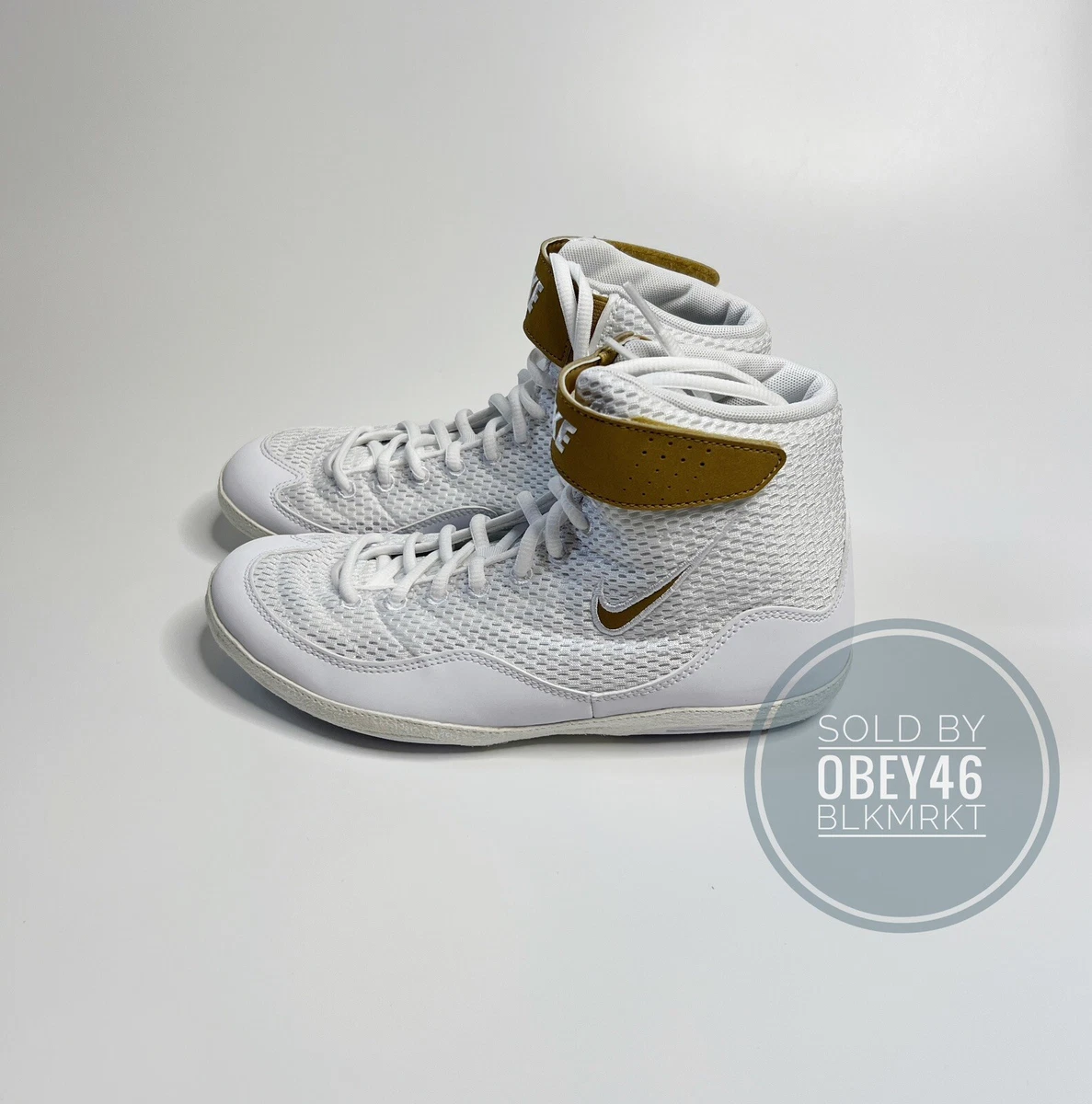 Gold and top white nike inflicts