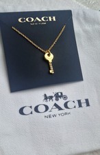 Coach Gold-toned Key Pendant Necklace New With Tag And Pouch