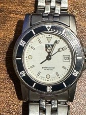 TAG Heuer Professional Quartz 200m Diver White Dial Black Bezel Date Steel