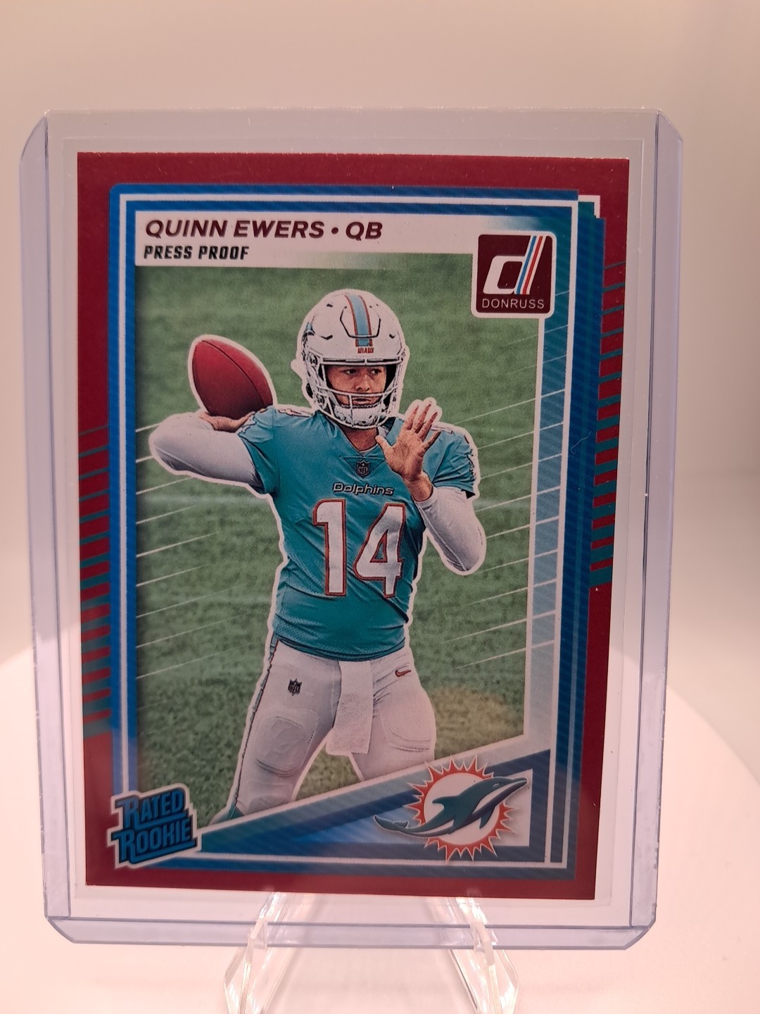 QUINN EWERS 2025 Donruss Football Red Press Proof Rated Rookie Dolphins #342