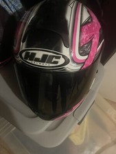 2 HJC helmets: 1 xs helmet and 1 medium helme...
