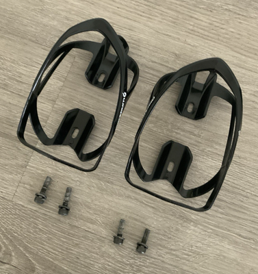 #ad #ad BLACKBURN WATER BOTTLE CAGES 2 BLACK 40 GRAMS HARDWARE INCLUDED $25.00