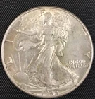 LOT # 1109    1940 WALKING LIBERTY HALF DOLLAR (HI-GRADE)