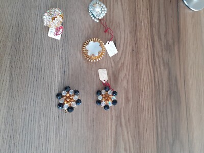 Broche boucle argentée strass rouge rubis