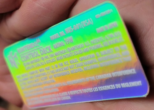 1 NINTENDO 64 N64 CONTROL DECK NUS-001(USA) CHROME HOLO WHITE TEXT LABEL STICKER - Picture 12 of 16
