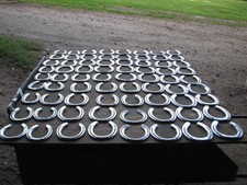 132 used aluminum horseshoes