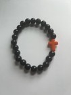 Black Beaded Stretch Bracelet with Orange Cross Charm | Christianity — photo 4