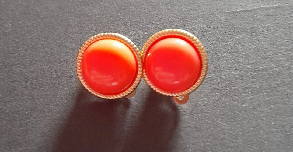 Orange clip shop on earrings