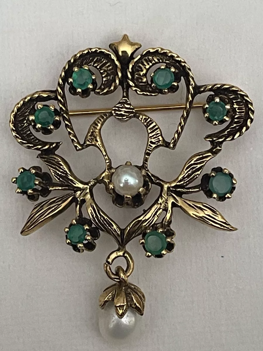 Emerald brooch deals