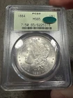 1884 Morgan Silver Dollar PCGS MS65 OGH CAC Toned