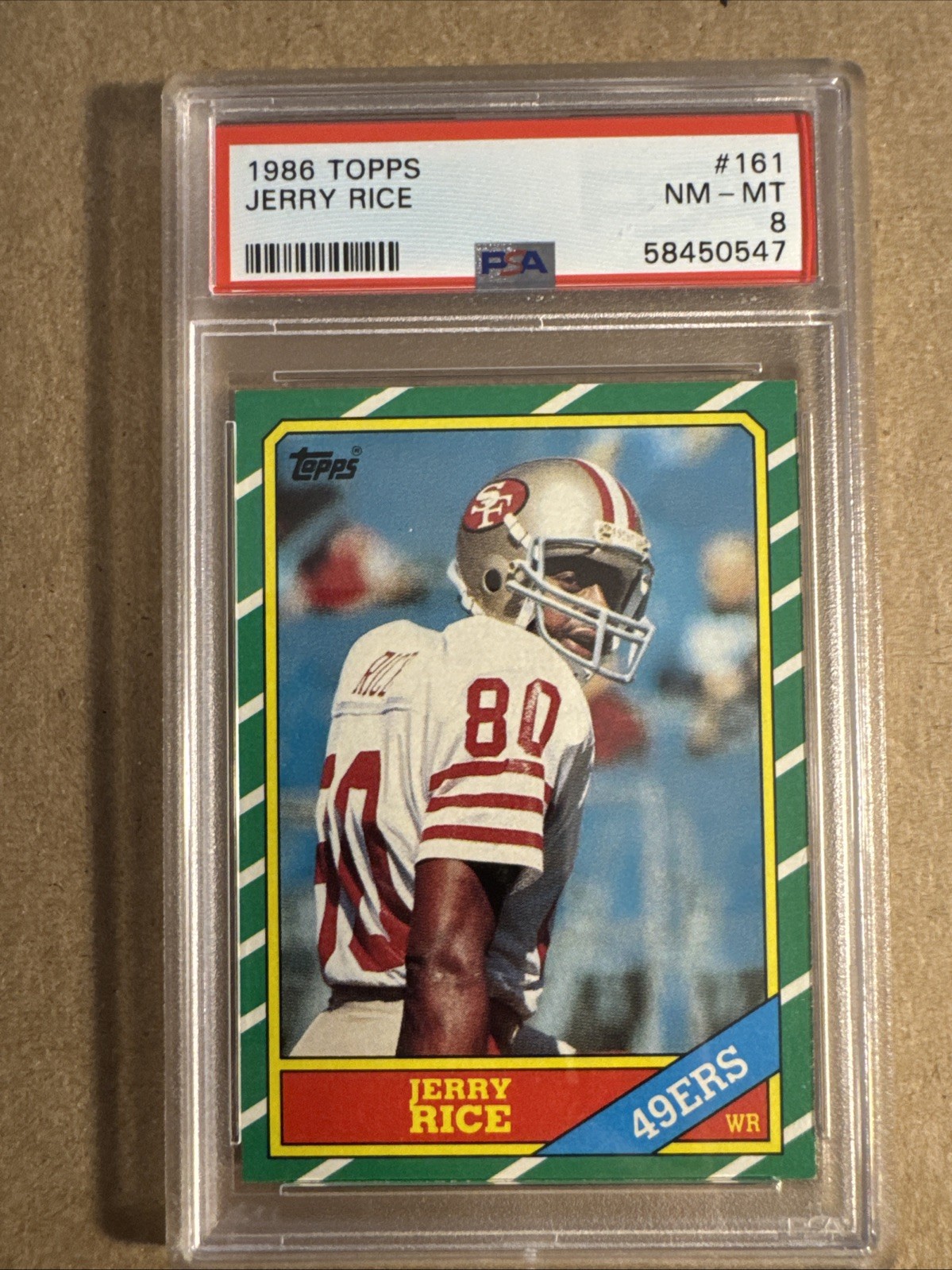 1986 Topps Jerry Rice #161 C* on Copyright Line Variation (RC) PSA 8 Very Clean