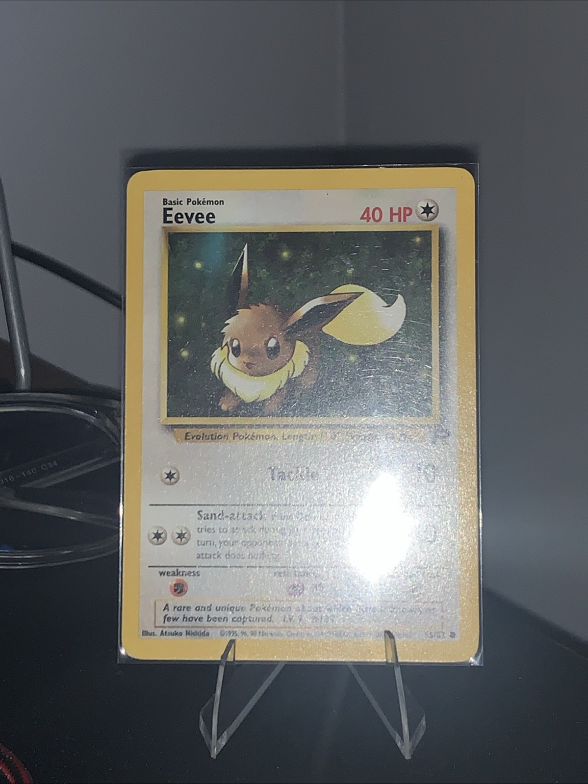 Eevee 55/82 Team Rocket-Unlimited Edition Regular
