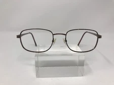 Looking Glass Eyeglasses 7562 52/20/145 Amber Brown M605