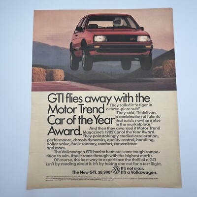 Volkswagen GTI 1985 Print Ad 10''x12'' levitating Motor Trend Car of the Year
