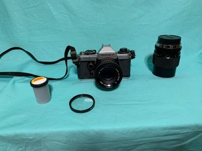 Vintage Yashica FX-D Quartz 35mm SLR Film Camera w/50mm 1:1.7 Plus addition lens