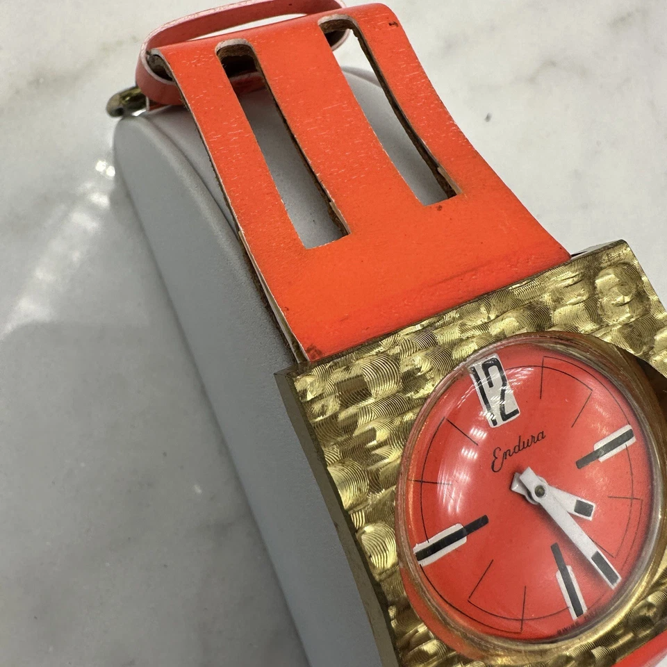Reloj Mecánico Raro Endura Tono Dorado, Esfera Naranja Brillante y Correa 40mm, Funciona Foto 2 de 4