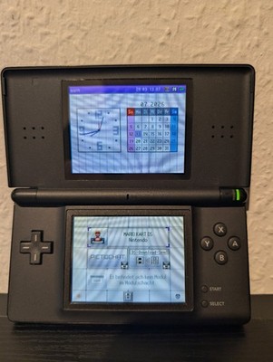 Nintendo DS Lite Spielkonsole - Schwarz Inkl. Ladekabel Und Mario Kart DS