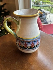 hand-painted ceramic pitcher, of Italian origin, possibly from the Deruta region