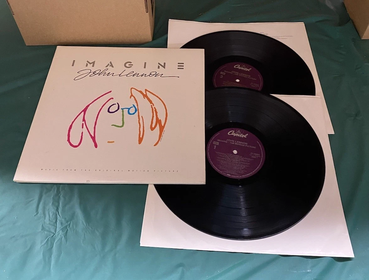 John Lennon Near Mint (NM or M -) 33 RPM Speed LP Vinyl Records