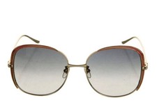 Gucci Women's Gold Frame Brown Lens Oversized Radiant Sunglasses