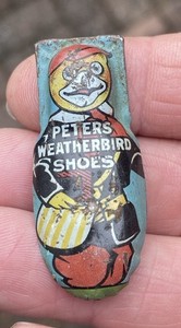 PETERS WEATHERBIRD SHOES - Tin Litho Advertising Toy Clicker / Noise Maker