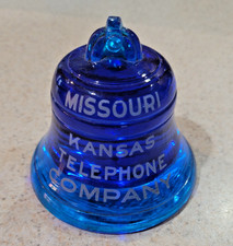 MISSOURI AND KANSAS TELEPHONE CO. GLASS BELL PAPERWEIGHT IN BLUE