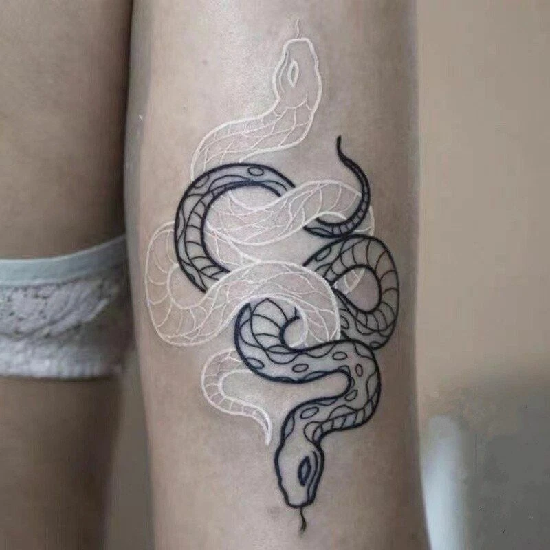 Top 52+ black and white snake tattoo in.cdgdbentre