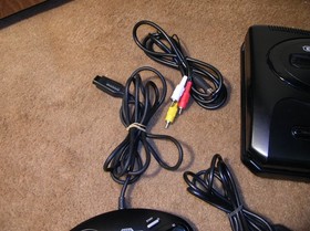 sega cd model 2 console and genesis/ w games