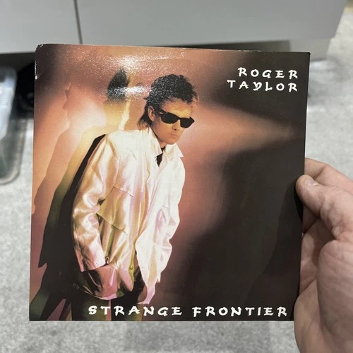 Roger Taylor Queen Strange Frontier 7”  Vinyl 1984. Very Nice Copy!l