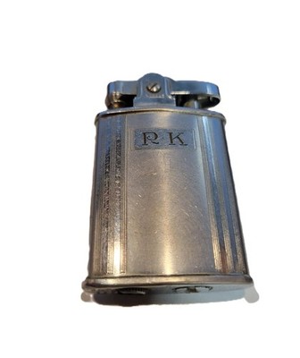 Vintage Chrome Ronson ''Banker'' Pocket Lighter RK on front