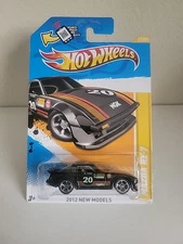 2012 Hot Wheels Mazda RX 7 New Models #31 BENT CARD CORNERS 
