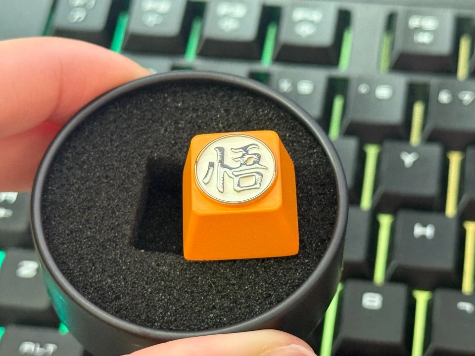 Llave de metal Son Goku chapada en aleación de aluminio tapa de llave Foto 2 de 4