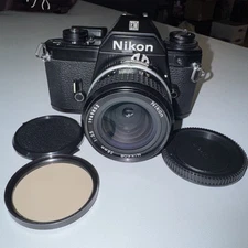 Nikon EM 35mm SLR Camera with 28mm 1:3.5 Nikor Lens & Hoya Filter