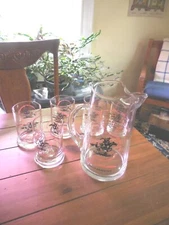 Winchester Firearms glass Pitcher and 6 glasses