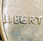 1957 MINT ERROR  WHEAT CENT Penny ('BIE'  IN LIBERTY)