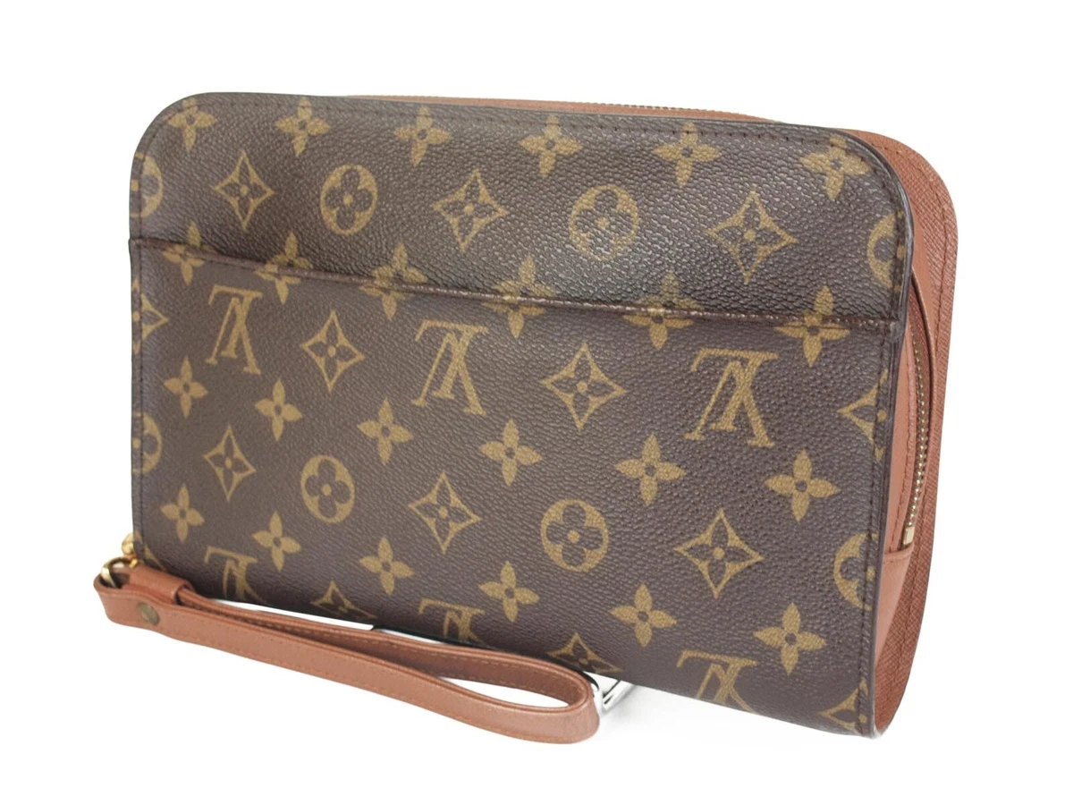 monogram canvas clutch