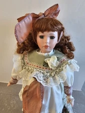 Porcelain lovely Doll vintage, 17 " tall. Hand painted face. Good condition