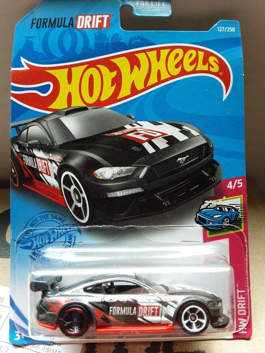 ミニカー Hot Wheels Ford MUSTANG GT Amazon.com: Hot Wheels 2009-041 New Models Yellow 2010 Ford