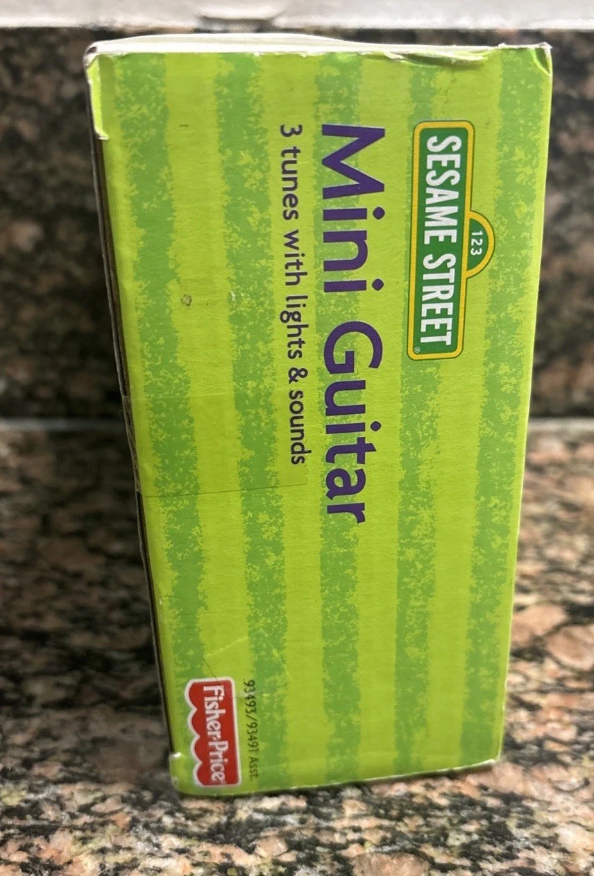 Sesame Street Elmo Musical Mini Guitar Fisher Price - Brand NEW