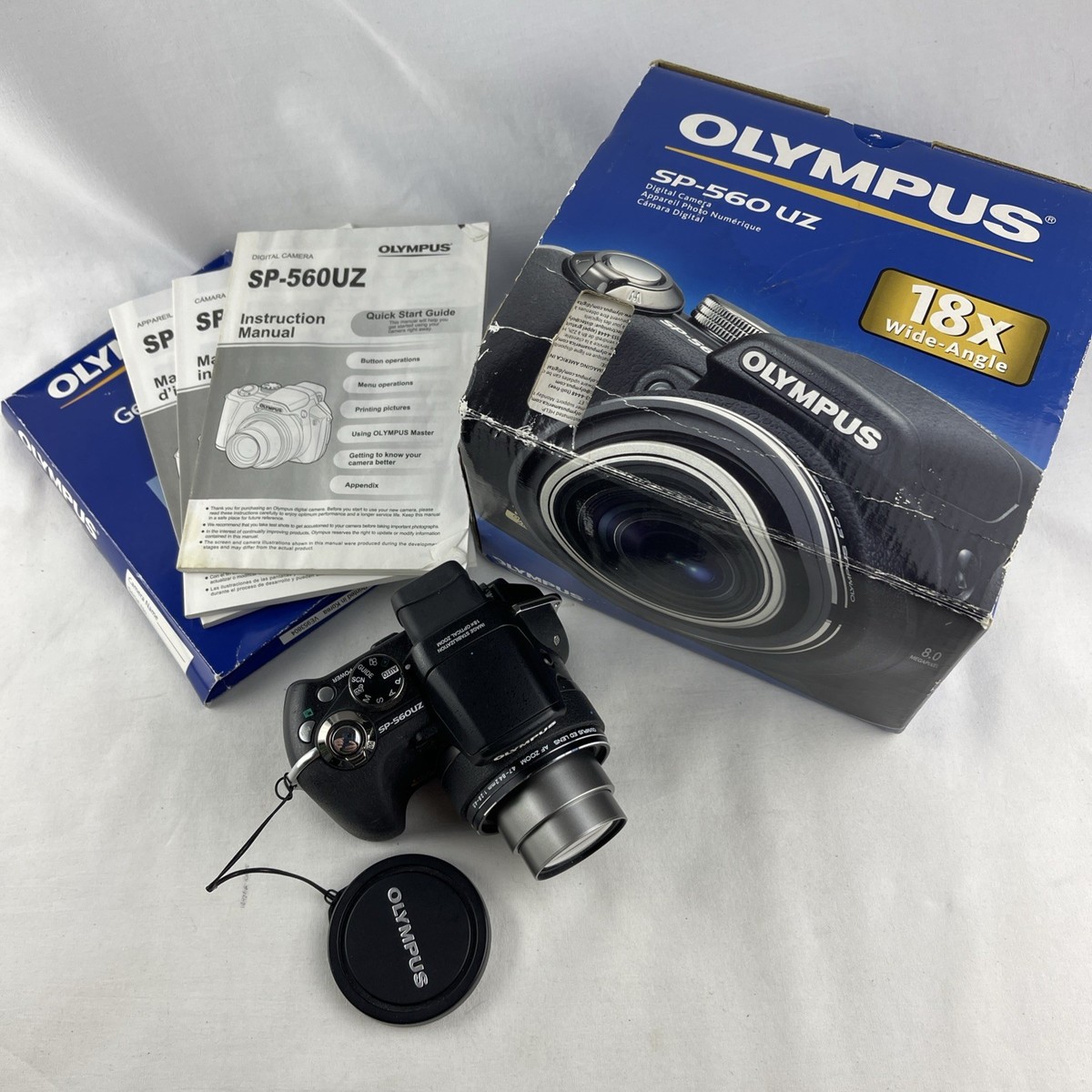 Olympus SP Series SP-560 UZ 8.0MP Digital Camera - Black for