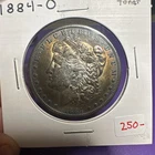 1884 O Morgan Silver Dollar $1 U.S. Coin "Toned" (M128)