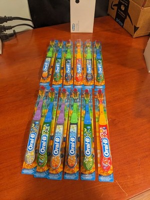 Box of 12 New Old Stock 2003 Oral B Stage 4 Toothbrushes PCN 663296 older child