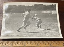 Snapshot, is he Safe? Runner to base with ball on its Way. Which was First?