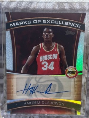 Hakeem Olajuwon 2025-2026 Topps Basketball Holo Auto Marks of Excellence