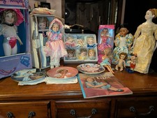 Variety of Dolls Along With Shirley Temple Dolls Plates